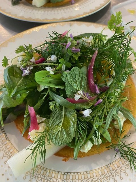 Quenelles with roasted kale and red pepper sauce